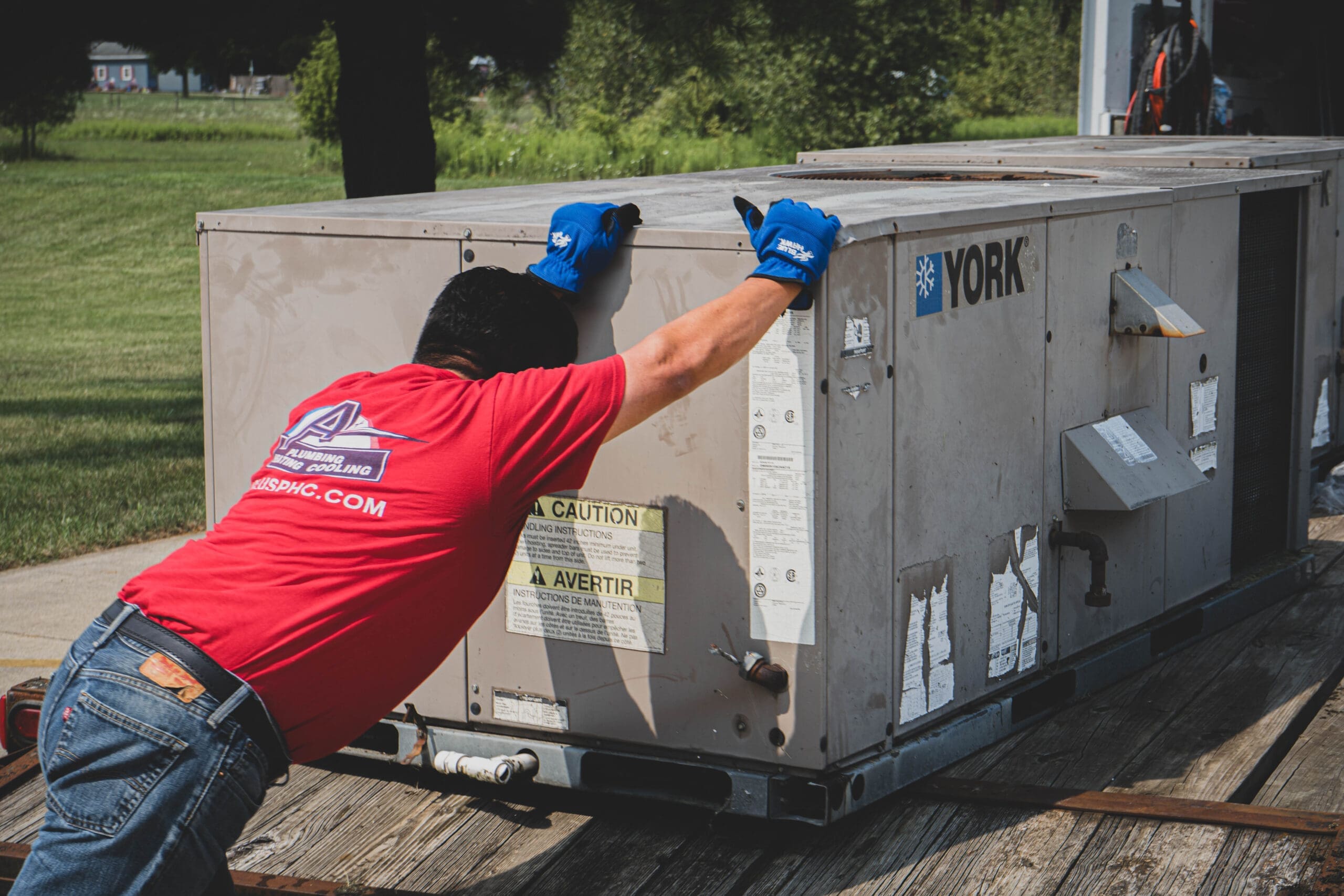 DSC03195 Technician moving York HVAC unit